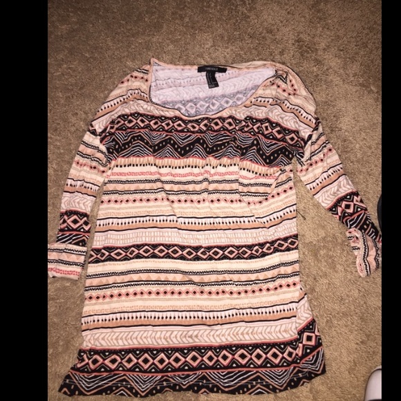 This is a mid- arm lengthed shirt.