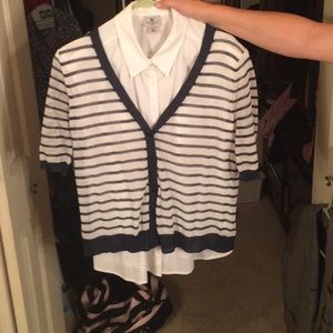 White shirt and striped sweater