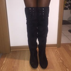 Knee high black studded boots