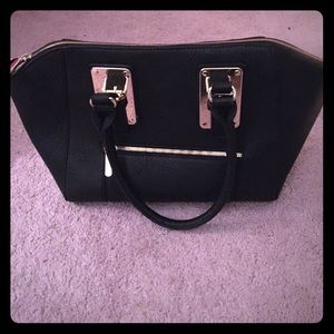 Black and gold alma style purse