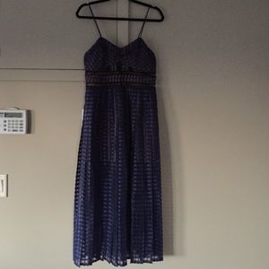 Brand new! Checkered navy midi dress with cutouts