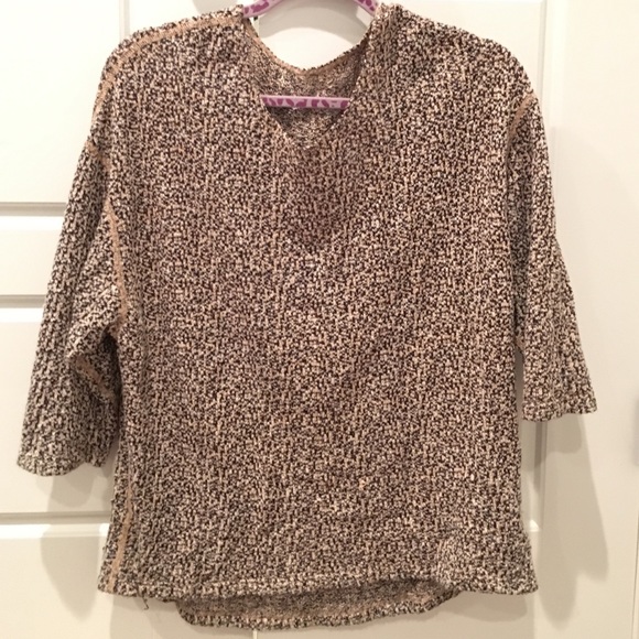 Blue and yellow speckled sweater