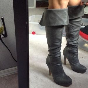 Grey leather knee high heeled boots