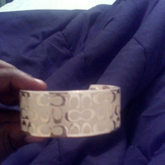 White enamel signature Coach cuff bracelet