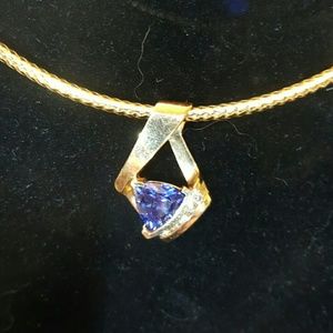 Gorgeous gold pendant with gemstone