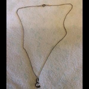 Tiffany and Co.   S necklace.