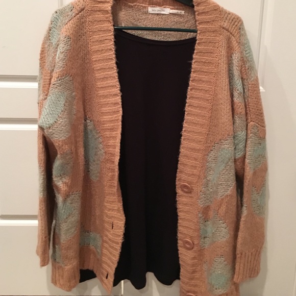 Super adorable pink and blue sweater