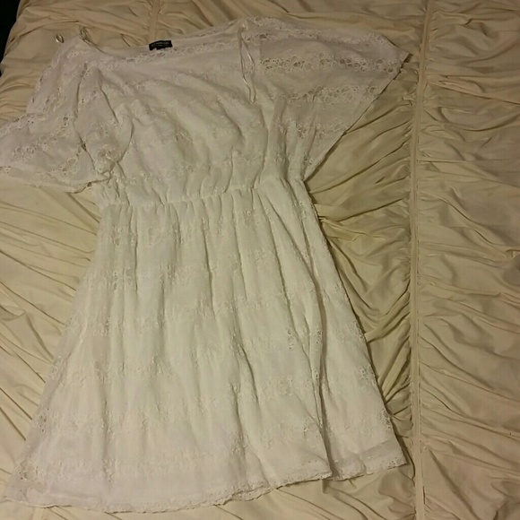 White lace dress with flutter sleeves