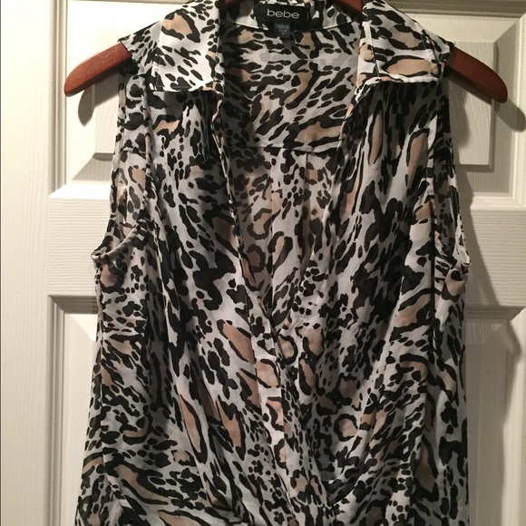 Bebe top open , wear with tank top or bandeau