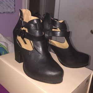 Black buckled heeled booties!