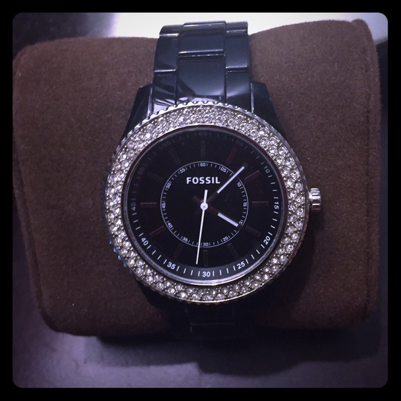 Black fossil watch with rhinestone rim.