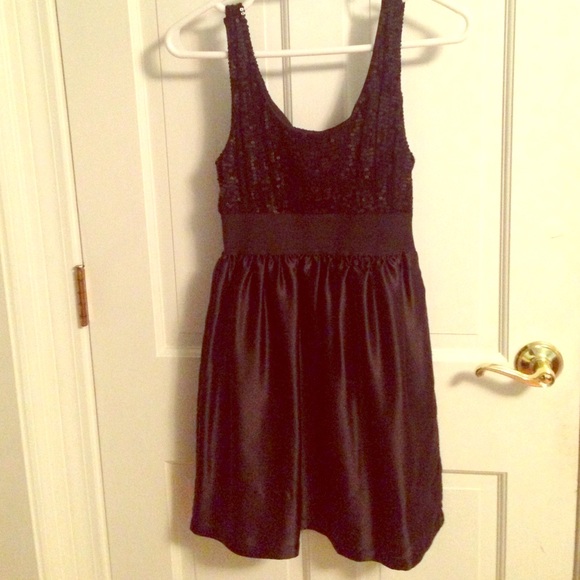 Black sequin top satin bottom with a synched waist
