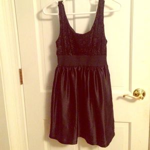 Black sequin top satin bottom with a synched waist