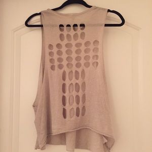 Tan muscle tee with cross cutout on back