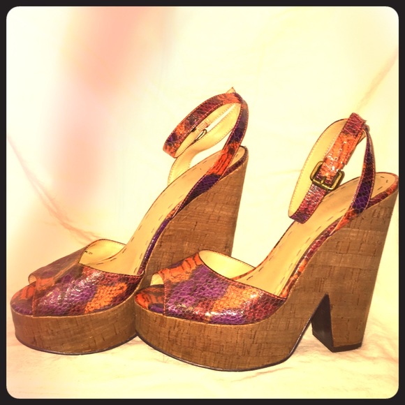 👠Nine West purple/or snake print heels. 👠