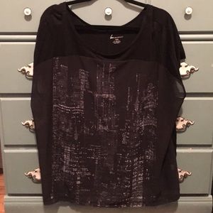 Black and sheer short sleeved top.