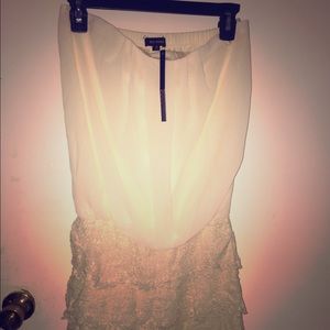 Strapless minidress, knit body fitting bottom. nwt