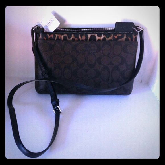 Coach Handbags - Coach peyton ocelot leopard print cross body bag !