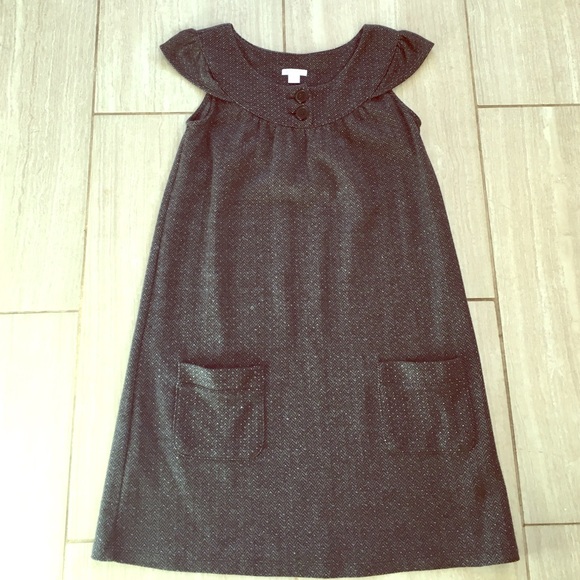 Black, grey and metallic jumper.