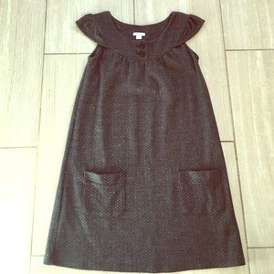 Black, grey and metallic jumper.