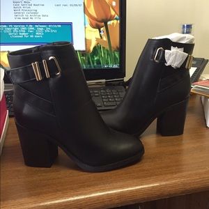 Brand new black booties