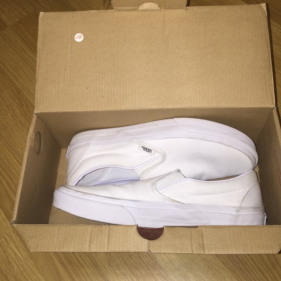White slip on vans
