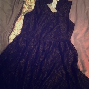 Black dress. Back cutout. Black print. Medium.