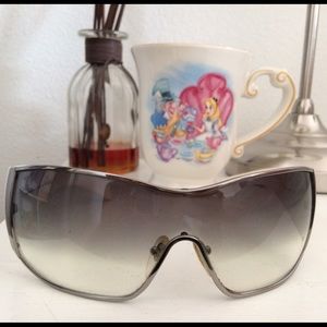 Used Salvatore Ferragamo sunglasses.