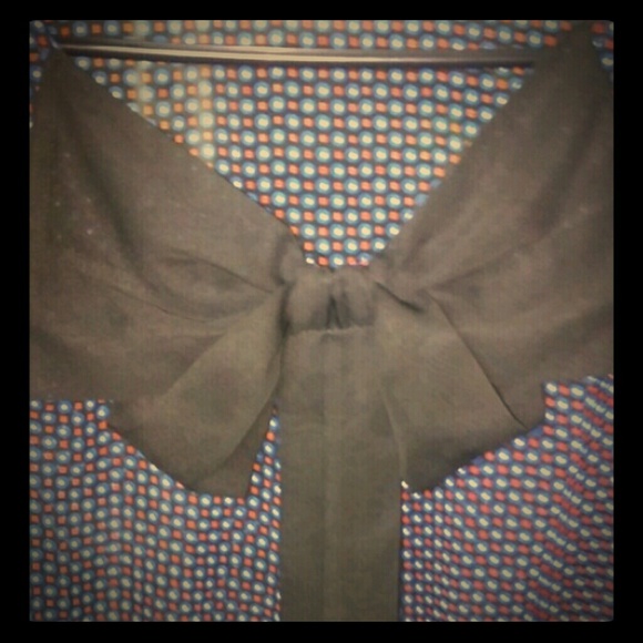 Sheer polka dot blouse with elegant bow