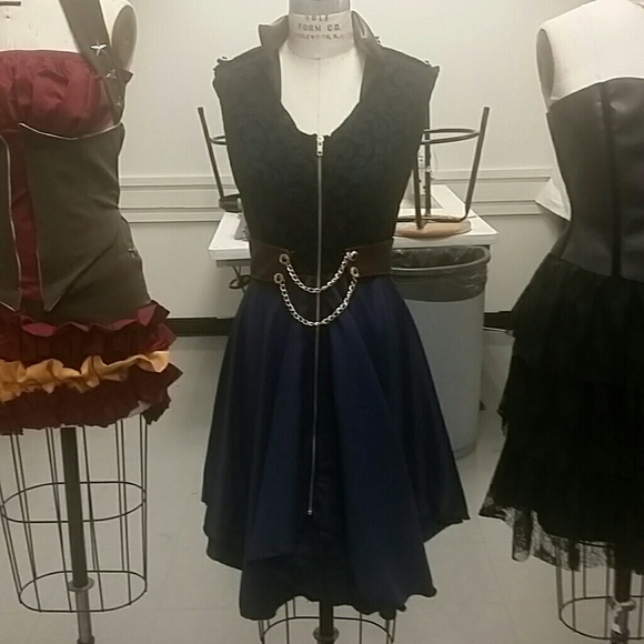 Blue, black and brown sleeveless jacket