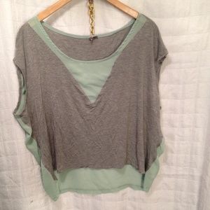 Grey and green sheet high low tank