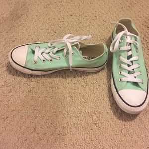 Mint green converse.