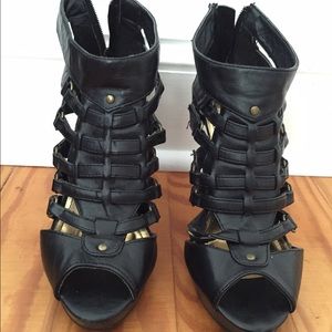 Strappy black heeled booties