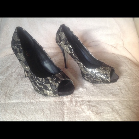 Aldo Shoe. Silver shimmer under Black lace.