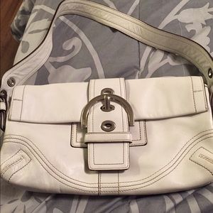 Small white leather coach