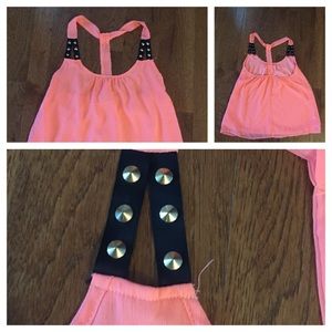 Cute top , with studs on the front.