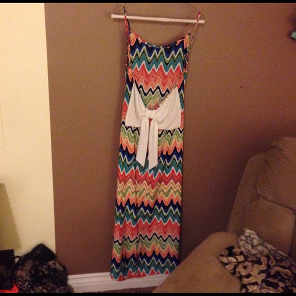 A low back maxi dress with a bow