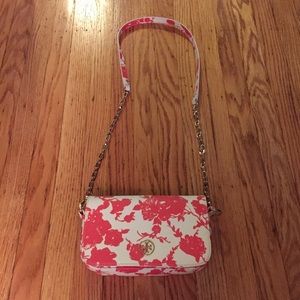 Authentic Tori Burch cross body patterned bag.