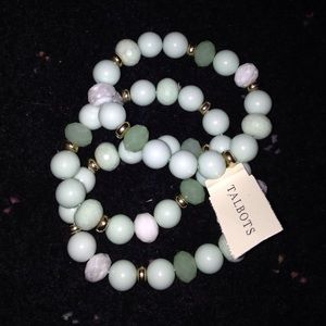 Green beaded stacked bracelets