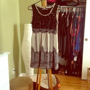 Black sequin top vintage style dress.