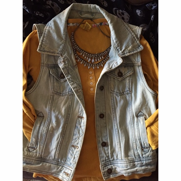Distressed denim jean vest