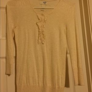 Cream light weight sweater.