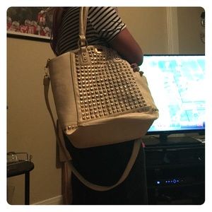 Gold studded beige purse