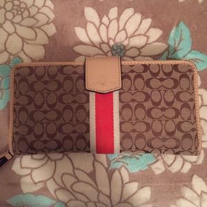 Tan and orange Coach wallet