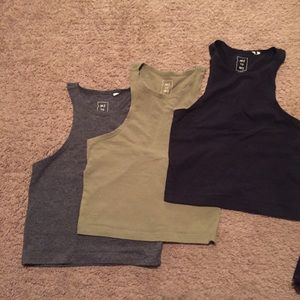 Three fitted crop tanks from Pacsun