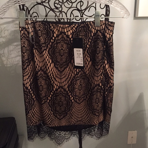 Black lace mini skirt - never been worn with tags