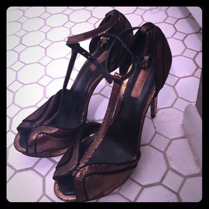 BCBG gold and black t-strap platforms