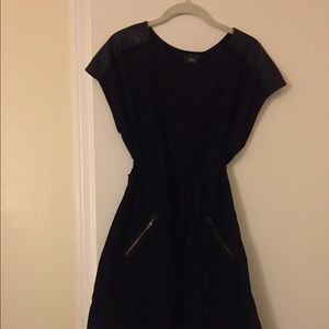 Black dress with zipper and leather accents