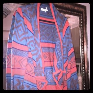 Sweater in orange/teal/chocolate print