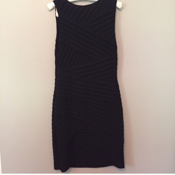 Asymmetrical bondage look dress - Picture 2 of 3